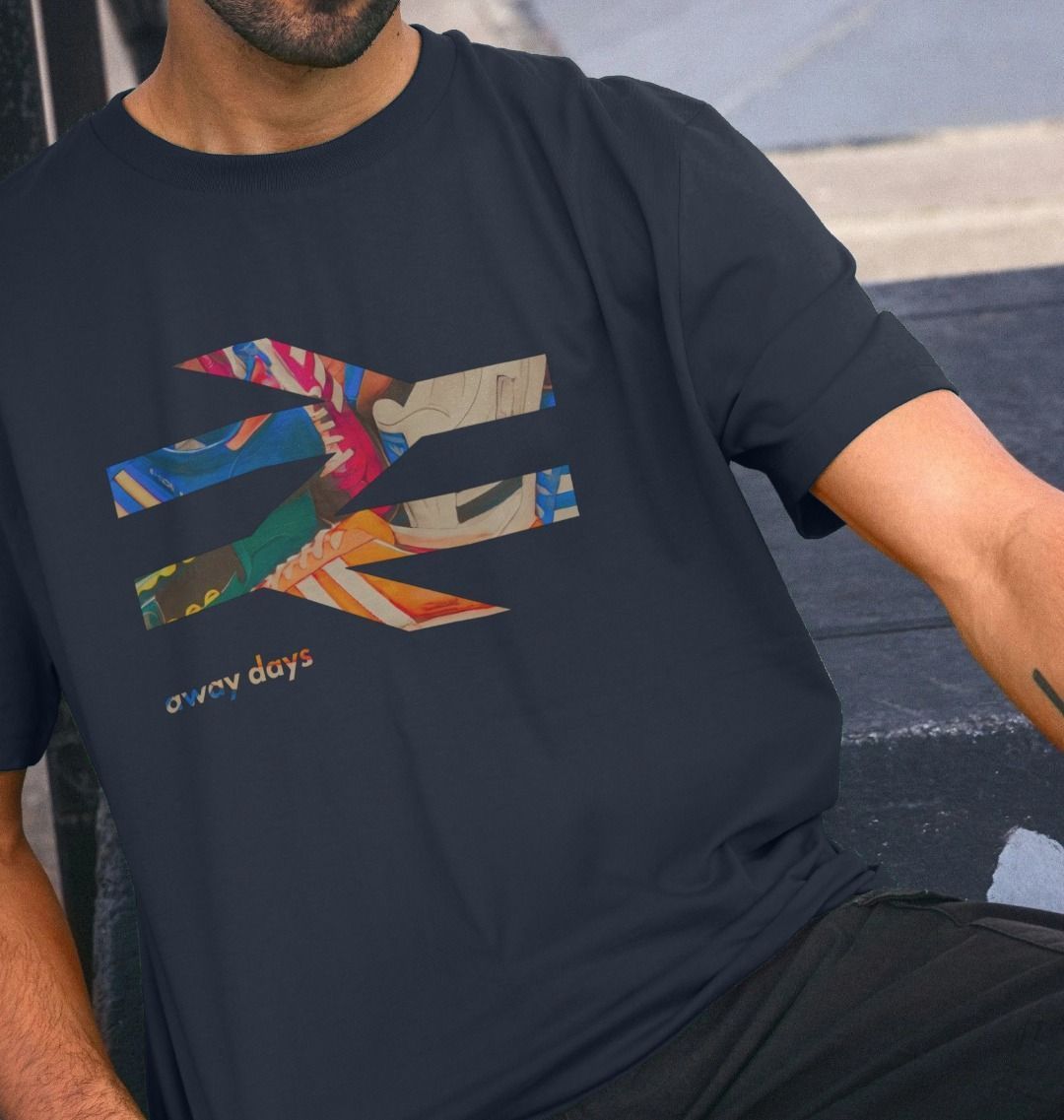 Terrace Awaydays navy t-shirt with vibrant trainers graphic, inspired by football culture and streetwear.